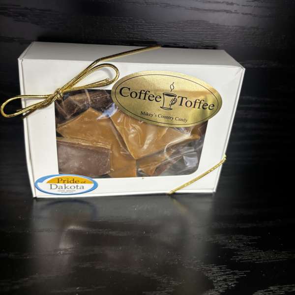 Box of coffee toffee candy tied with a gold ribbon