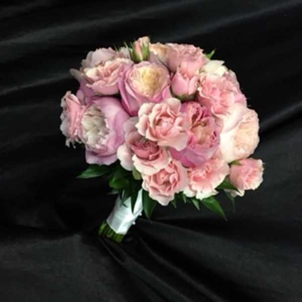 Pink rose bouquet with white accents and wrapped stems