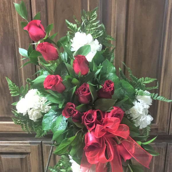 cross with red roses