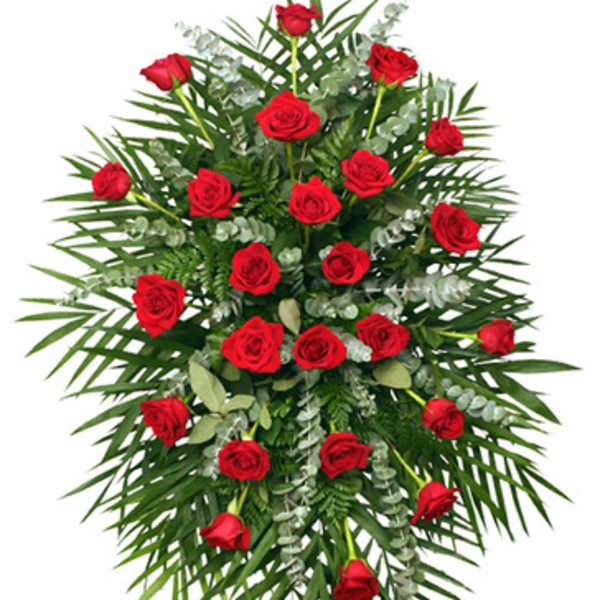 Standing spray of red roses with palm fronds and eucalyptus