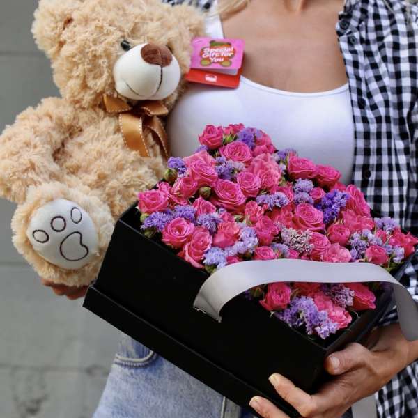Pink rose bouquet in a black box with a teddy bear