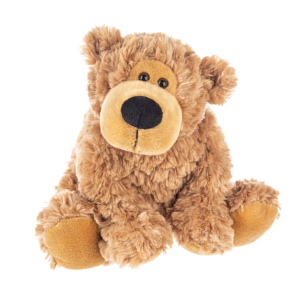 Plush teddy bear sitting on a white background