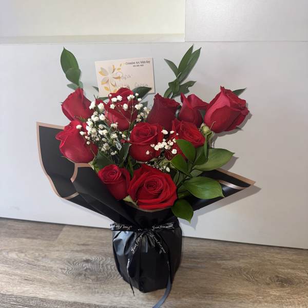 glass vase with beautiful roses