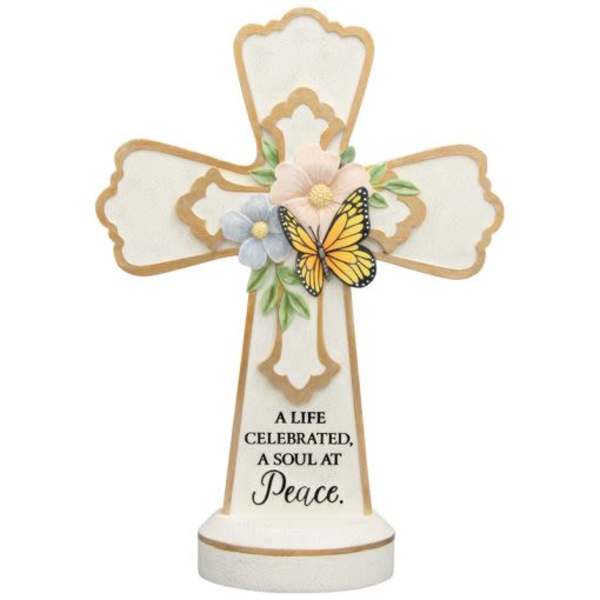 Decorative memorial cross with flowers and a butterfly