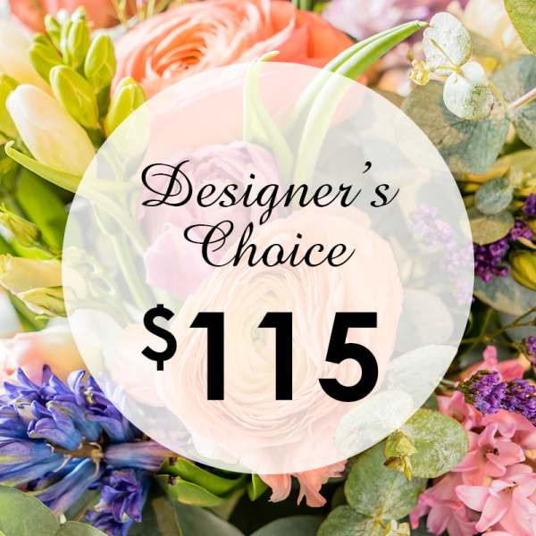 Mixed pastel flower arrangement with a "Designer’s Choice" $115 label