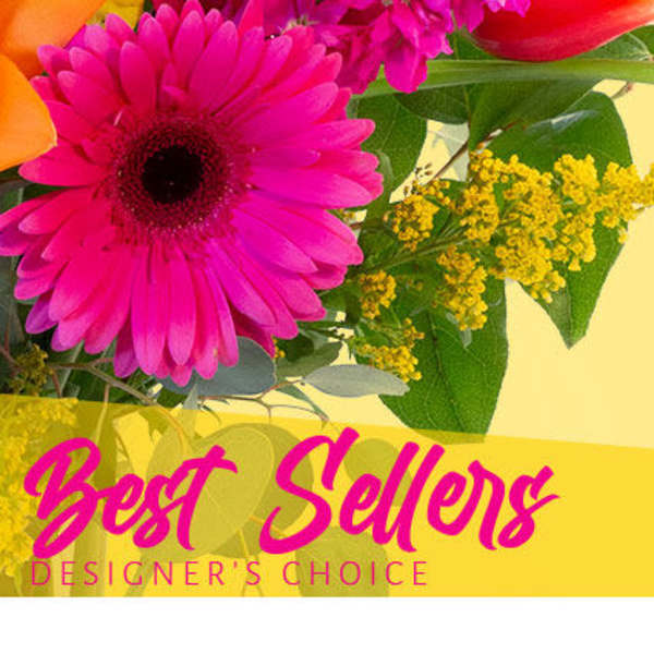 Bright mixed bouquet with pink gerbera, orange tulips, and yellow filler flowers