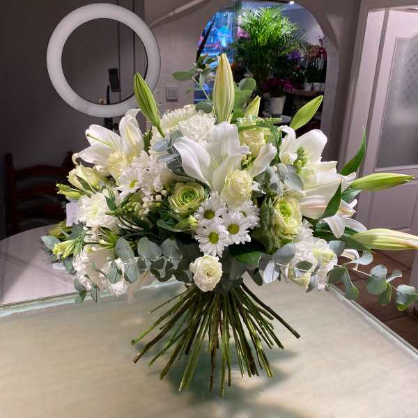 White lily and rose bouquet with daisies and eucalyptus