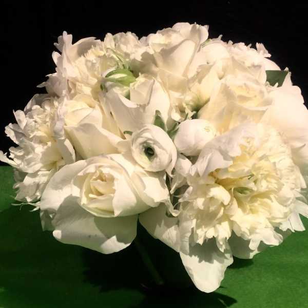 White flower bouquet with roses and peonies