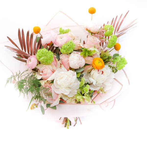 Pink and white bouquet with green accents and orange pom-pom flowers