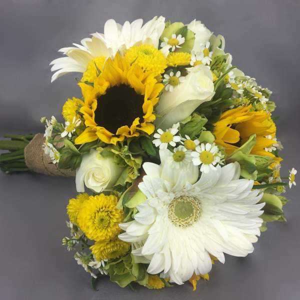 Bouquet of sunflowers, white daisies, and white roses