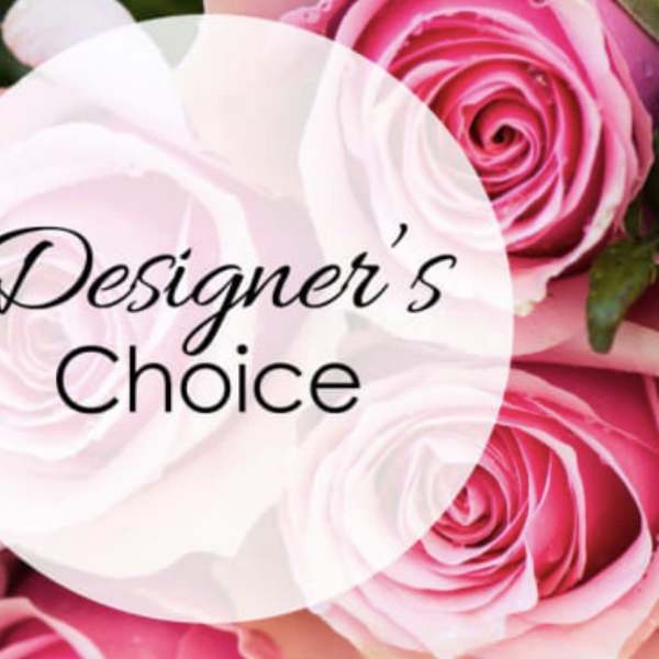 Close-up of pink and white roses with a Designer’s Choice text overlay