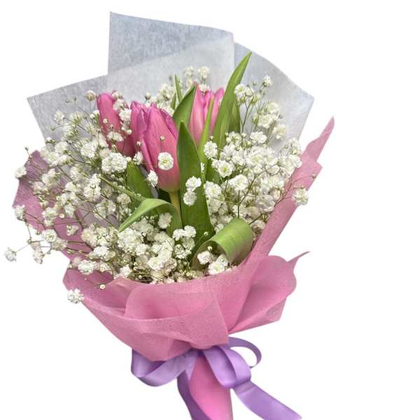 Pink tulip bouquet with white baby's breath and purple wrapping