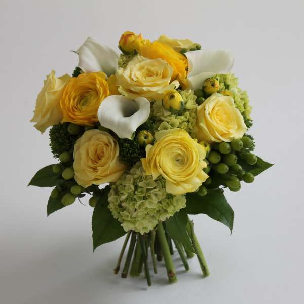 Yellow rose bouquet with white calla lilies and green hydrangea