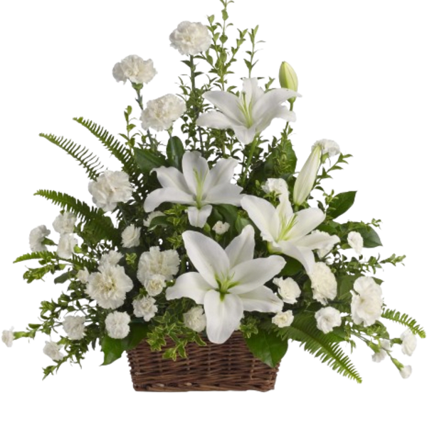 White lilies and carnations in a wicker basket