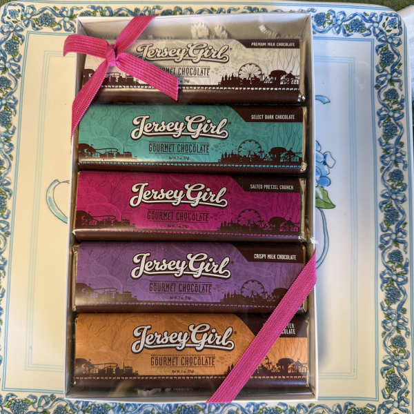 Gift box of Jersey Girl chocolate bars tied with pink ribbon
