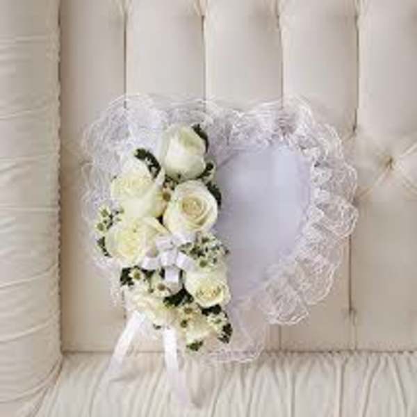 White rose heart wreath with a sheer ribbon bow