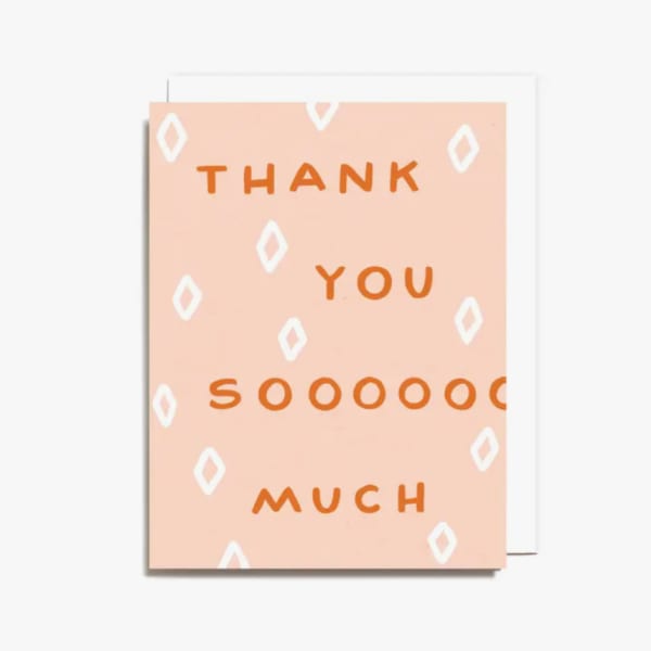 Peach thank-you card with orange text and white diamond pattern
