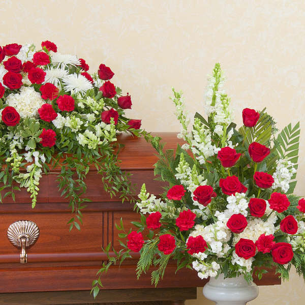 Casket spray, standing arrangement, and rose wreath in red and white