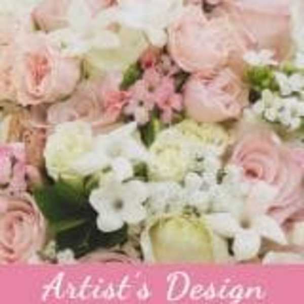 Pink and white roses arranged in a floral display