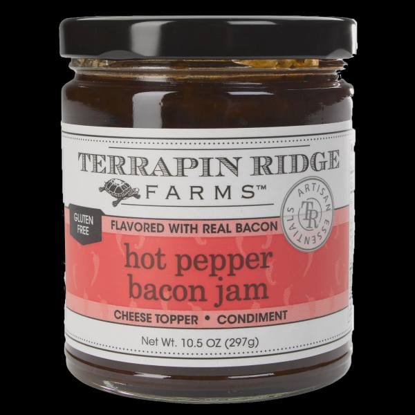 Jar of hot pepper bacon jam with a black lid