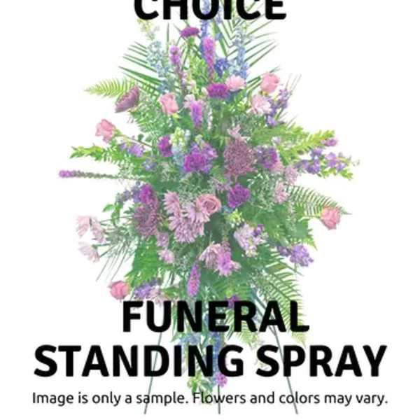 Standing funeral spray with pink and purple flowers
