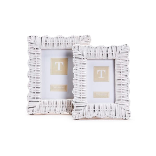 Two white woven picture frames on a white background