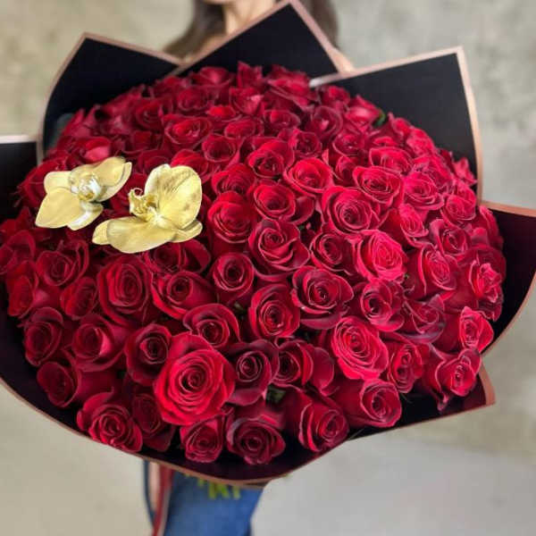 Large bouquet of red roses with two gold orchids