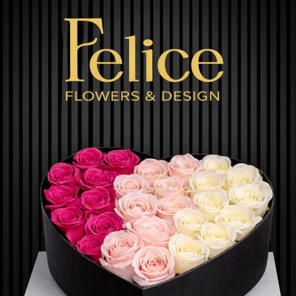 Heart-shaped box of pink and white roses