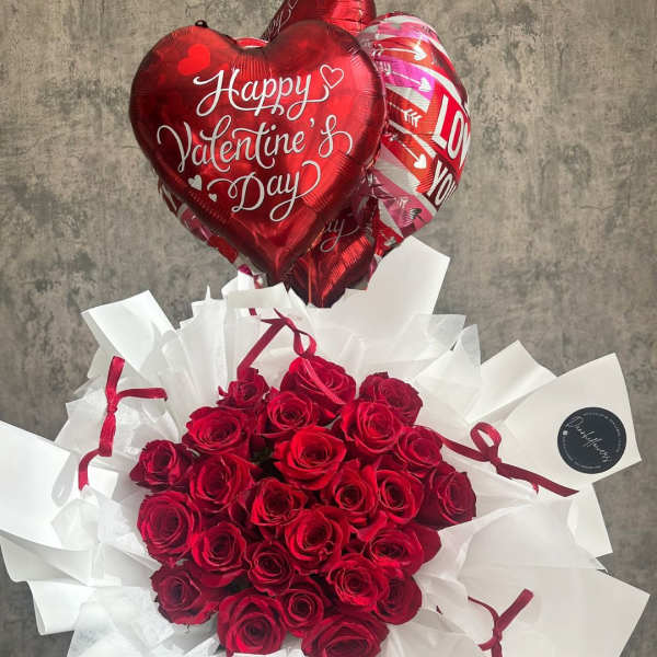 Red rose bouquet with heart-shaped Valentine balloons