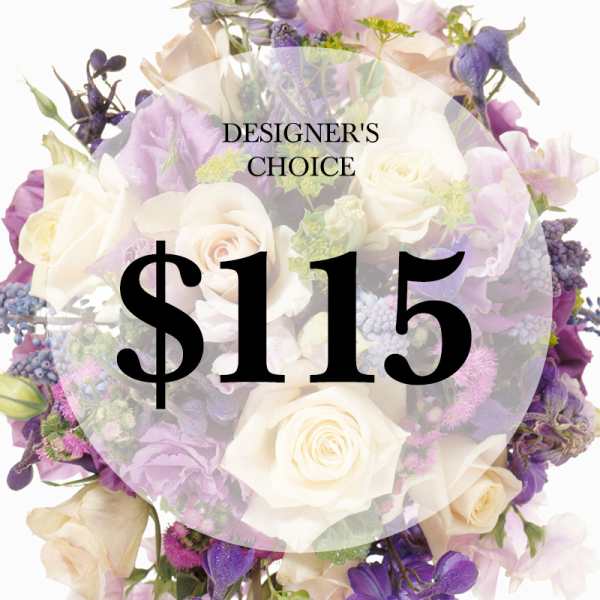 Mixed bouquet of white, lavender, and purple flowers with a $115 label