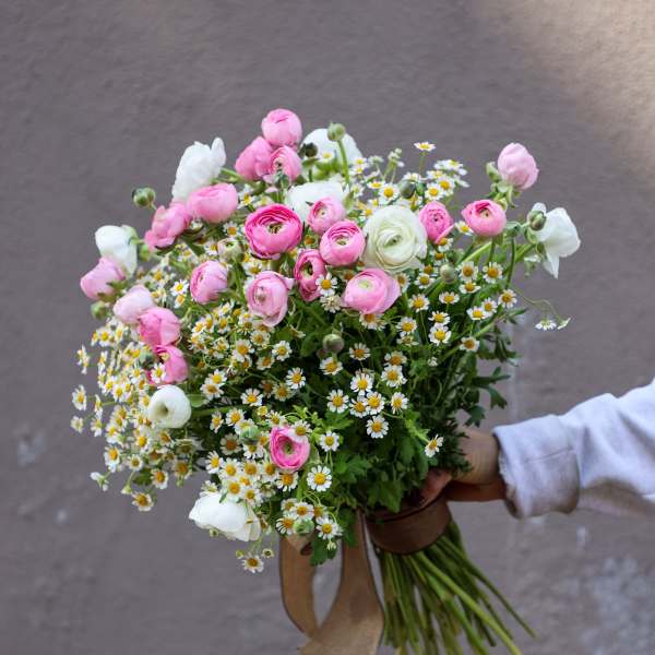 Pink and white bouquet with small daisy-like flowers