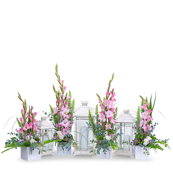 Pink floral arrangements with white lanterns