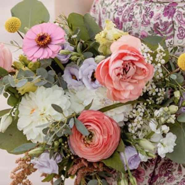 Pastel bouquet with pink, coral, white, and lavender flowers