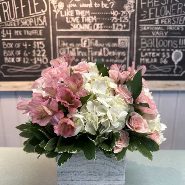 Pink and white bouquet in a gray wooden box
