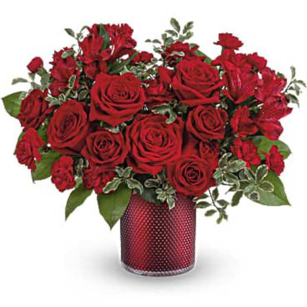 Red roses arranged in a red textured vase