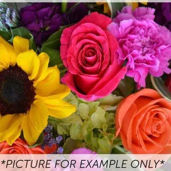 Mixed bouquet with roses, a sunflower, and purple blooms