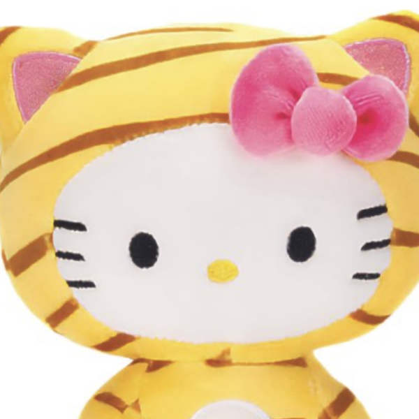 Hello Kitty plush toy in a yellow tiger costume with a pink bow