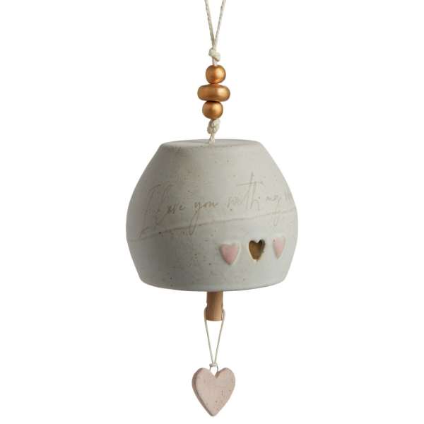 Ceramic hanging ornament with heart cutouts and a dangling heart charm