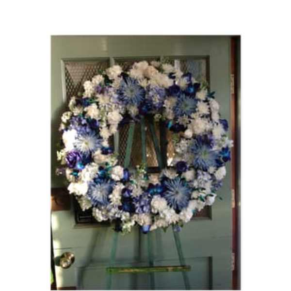 Blue and white floral wreath on a door