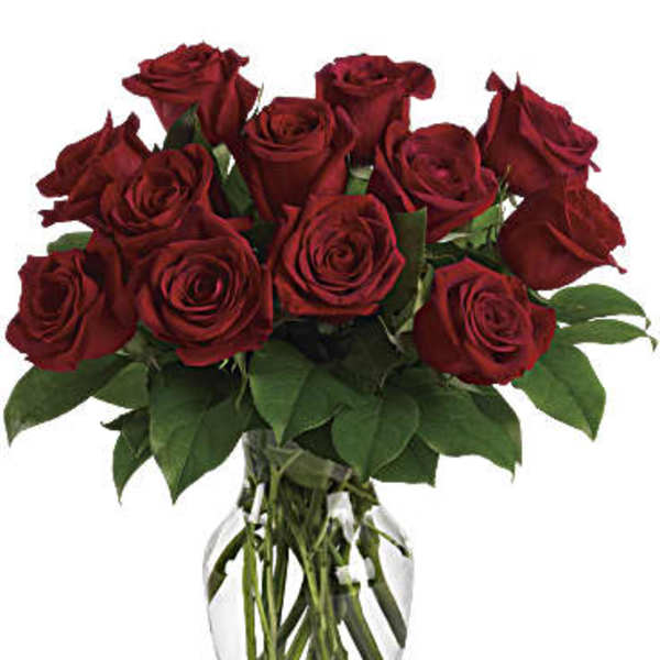 Bouquet of red roses in a clear glass vase
