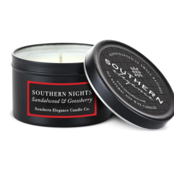 Black candle tin with lid labeled Southern Nights