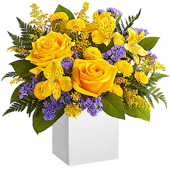 Yellow roses and alstroemeria in a white box vase