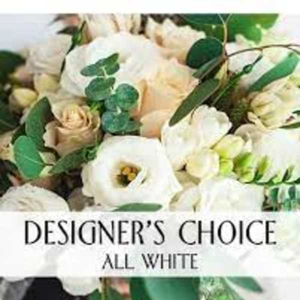 White floral bouquet with green foliage and the text "Designer’s Choice All White"