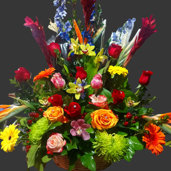 Colorful mixed flower basket with roses, orchids, and gerbera daisies
