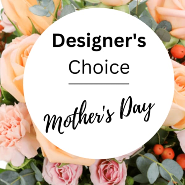 Peach and pink roses with eucalyptus around a Mother's Day label