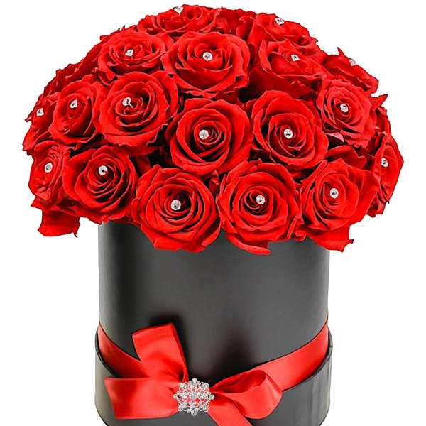 Red roses arranged in a black hatbox with a red ribbon