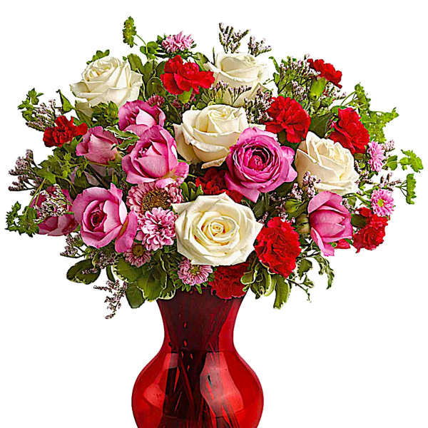 Mixed pink, white, and red roses in a red glass vase