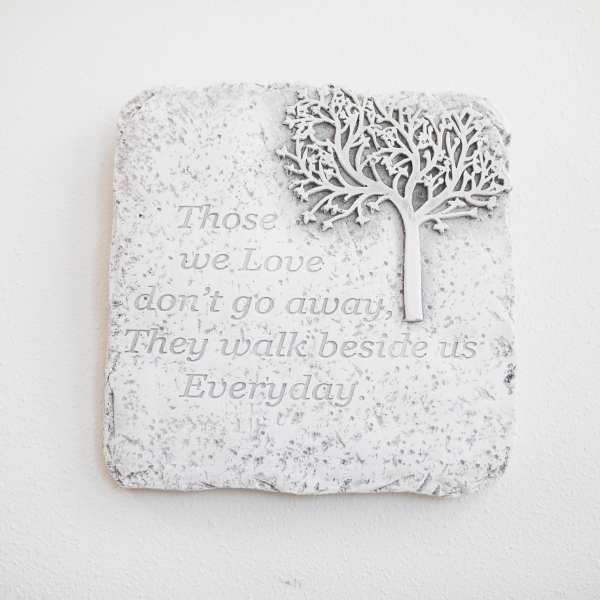Decorative wall plaque with a tree and memorial quote