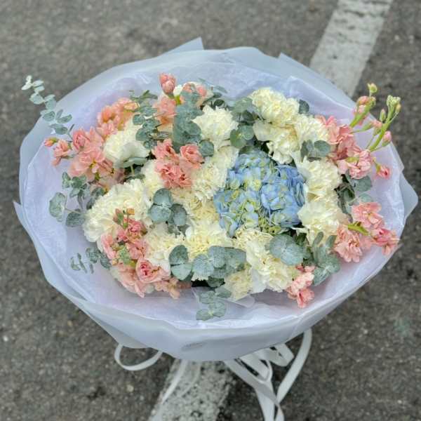 delicate bouquet for a girl with blue hydrangea
