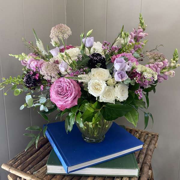 Pink and white mixed bouquet in a glass vase